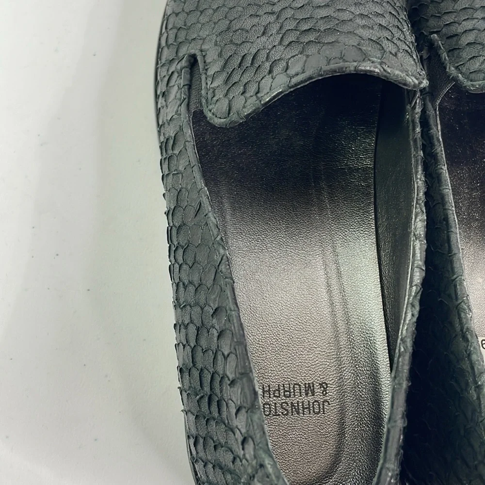 Johnston and Murphy, 781-1545. Texturized black leather loafers with gray soles.